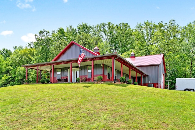 4499 Benson Rd, Springfield, TN 37172 - farmhouse with a chimney, a front yard, and a porch