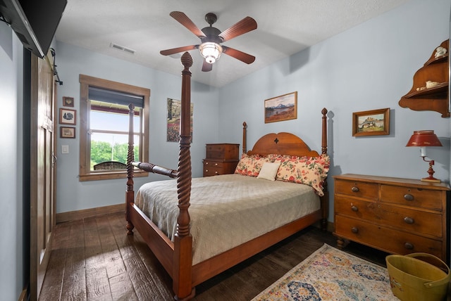 4499 Benson Rd, Springfield, TN 37172 - bedroom with dark wood-type flooring, baseboards, and a ceiling fan