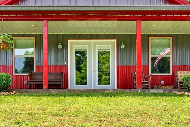 4499 Benson Rd, Springfield, TN 37172 - entrance to property featuring a porch, a yard, and board and batten siding
