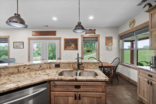 4499 Benson Rd, Springfield, TN 37172 - kitchen with dishwasher, a sink, dark wood finished floors, recessed lighting, and a textured ceiling