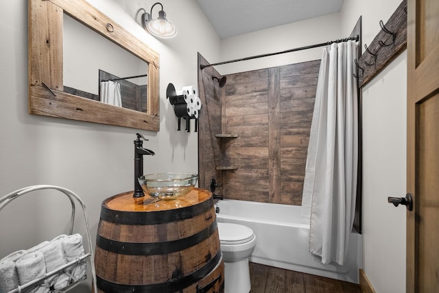 4499 Benson Rd, Springfield, TN 37172 - full bathroom with shower / bath combo, wood finished floors, toilet, and vanity