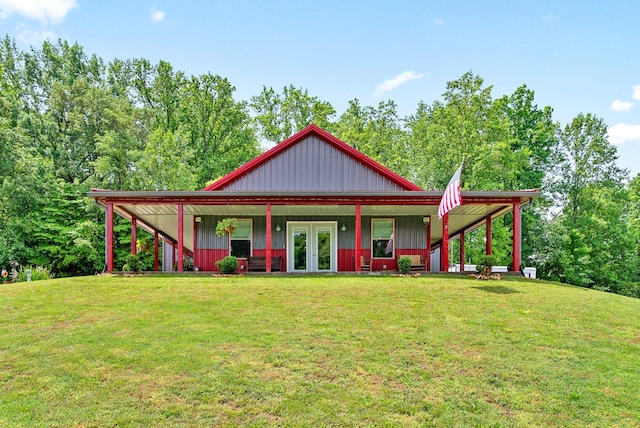 4499 Benson Rd, Springfield, TN 37172 - country-style home with french doors, a front lawn, and board and batten siding