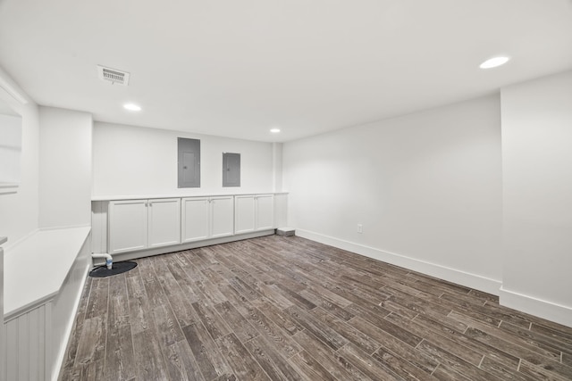 2107 Kidd Rd, Nolensville, TN 37135 - unfurnished room featuring electric panel, dark wood-style flooring, recessed lighting, and baseboards