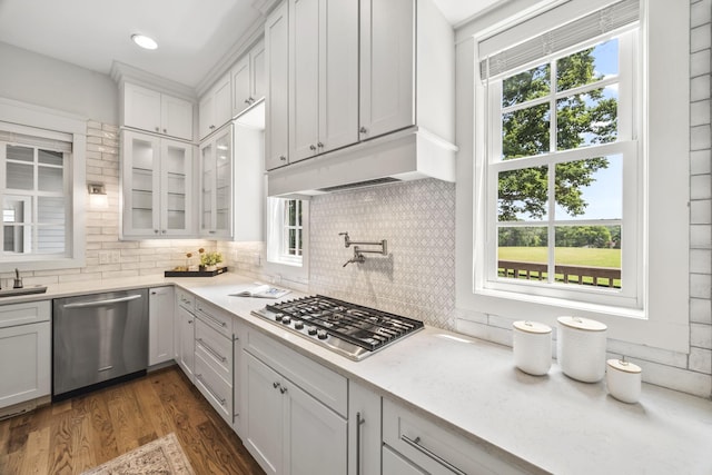 2107 Kidd Rd, Nolensville, TN 37135 - kitchen with stainless steel appliances, custom exhaust hood, a sink, light countertops, and recessed lighting