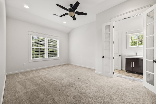 2107 Kidd Rd, Nolensville, TN 37135 - unfurnished bedroom featuring multiple windows, carpet floors, baseboards, recessed lighting, and french doors