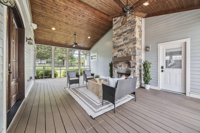 2107 Kidd Rd, Nolensville, TN 37135 - wooden deck with a ceiling fan and an outdoor living space with a fireplace