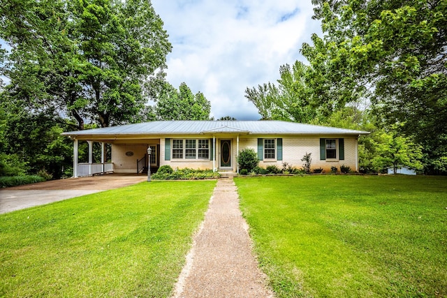 406 Longview St, Camden, TN 38320 - ranch-style house featuring driveway, a carport, a front yard, brick siding, and metal roof