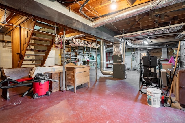 406 Longview St, Camden, TN 38320 - unfinished basement with stairs and heating unit