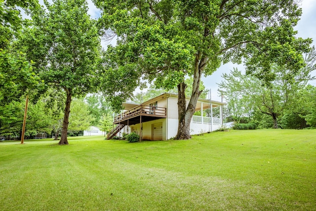 406 Longview St, Camden, TN 38320 - view of grassy yard with a deck and stairs