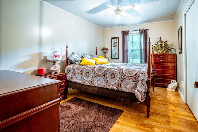 406 Longview St, Camden, TN 38320 - bedroom with ornamental molding, light wood-style floors, and ceiling fan