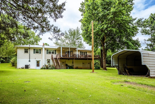 406 Longview St, Camden, TN 38320 - view of green lawn featuring a wooden deck, a detached carport, stairs, and cooling unit