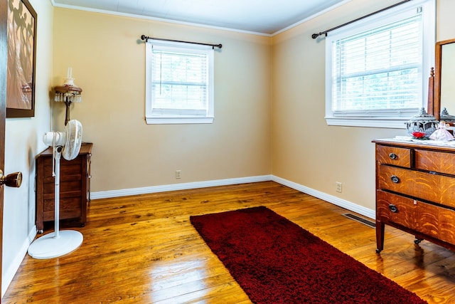 406 Longview St, Camden, TN 38320 - bedroom featuring ornamental molding, hardwood / wood-style flooring, and baseboards