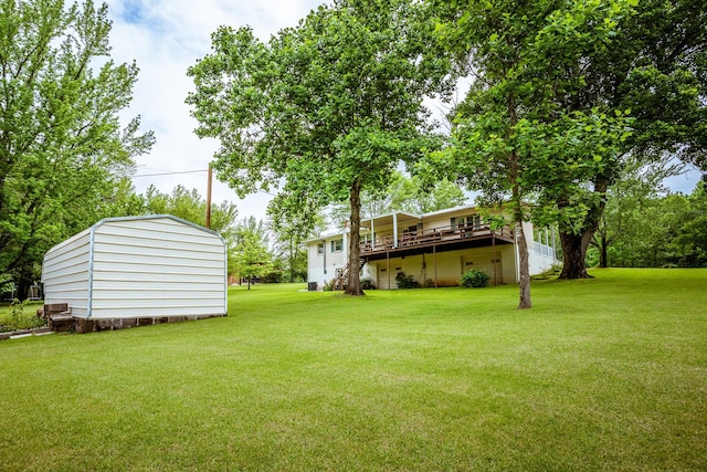 406 Longview St, Camden, TN 38320 - view of grassy yard with a deck