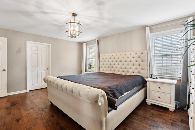 5720 Saint Charles Ct, Hermitage, TN 37076 - bedroom with dark wood-type flooring, a chandelier, and baseboards