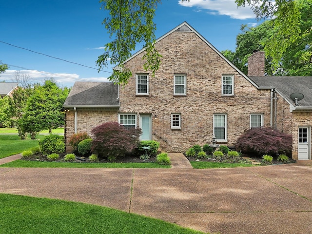 5720 Saint Charles Ct, Hermitage, TN 37076 - view of front of property with brick siding, a chimney, and a shingled roof