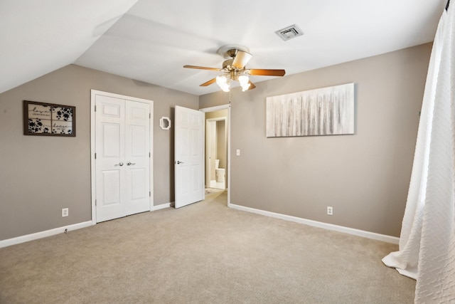 5720 Saint Charles Ct, Hermitage, TN 37076 - unfurnished bedroom featuring light colored carpet, baseboards, ceiling fan, and lofted ceiling