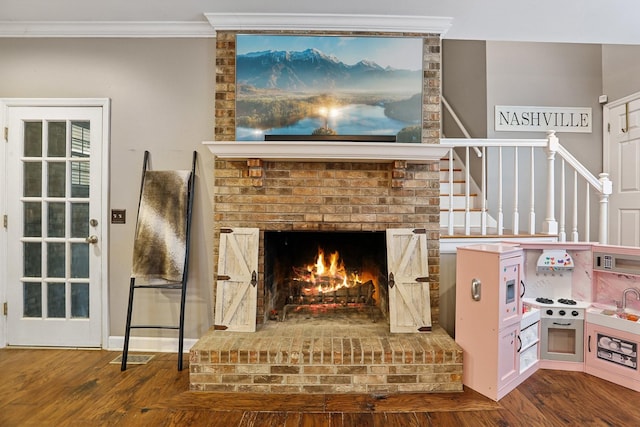 5720 Saint Charles Ct, Hermitage, TN 37076 - detailed view of ornamental molding, a brick fireplace, wood finished floors, and a sink