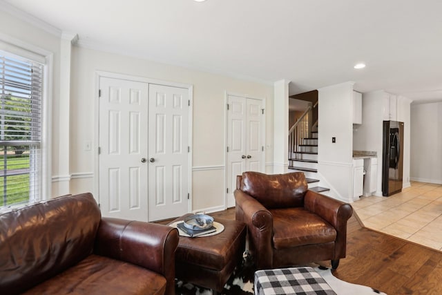 5720 Saint Charles Ct, Hermitage, TN 37076 - living room featuring stairs, recessed lighting, ornamental molding, and light wood finished floors