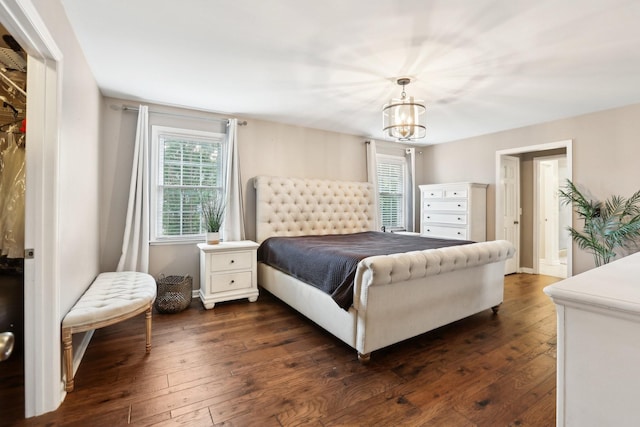 5720 Saint Charles Ct, Hermitage, TN 37076 - bedroom featuring a chandelier and dark wood-style flooring