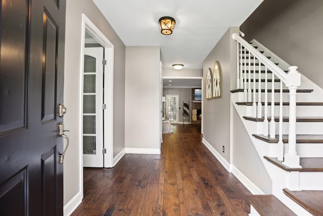 5720 Saint Charles Ct, Hermitage, TN 37076 - entryway with wood finished floors, baseboards, and stairway