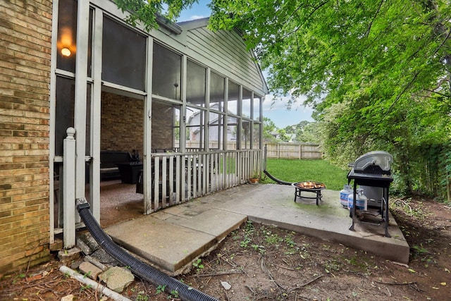 5720 Saint Charles Ct, Hermitage, TN 37076 - view of patio / terrace with a fire pit, a sunroom, and a grill