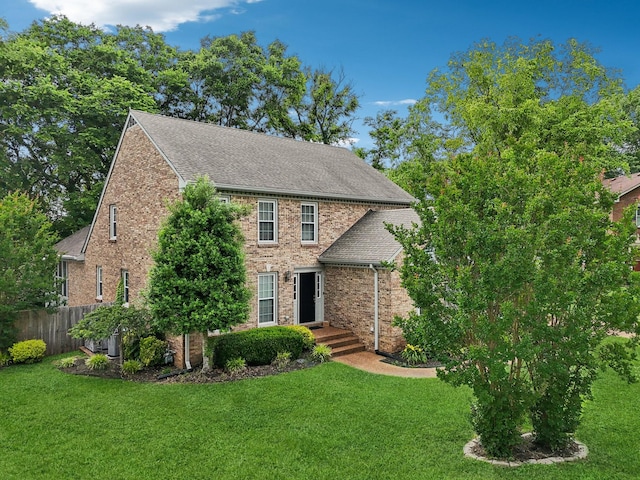 5720 Saint Charles Ct, Hermitage, TN 37076 - view of front facade featuring roof with shingles, central AC unit, and brick siding