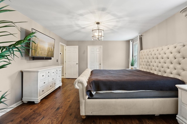 5720 Saint Charles Ct, Hermitage, TN 37076 - bedroom with dark wood-style floors, baseboards, and a chandelier