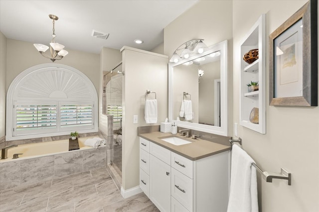 440 Ridgestone Dr, Franklin, TN 37064 - full bathroom featuring a chandelier, a bath, vanity, and a shower stall