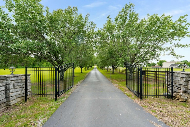 5740 Johnson Rd, Murfreesboro, TN 37127 - view of asphalt driveway with a gate and a gated entry