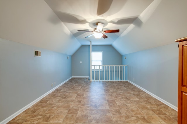 5740 Johnson Rd, Murfreesboro, TN 37127 - additional living space with ceiling fan, baseboards, lofted ceiling, and stone finish flooring