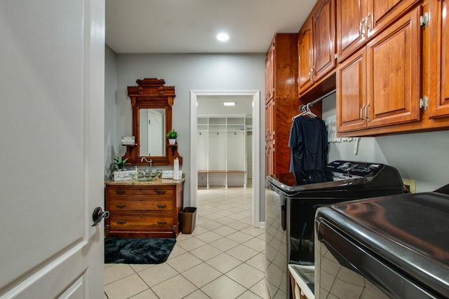 5740 Johnson Rd, Murfreesboro, TN 37127 - washroom featuring washer and clothes dryer, cabinet space, light tile patterned flooring, and recessed lighting