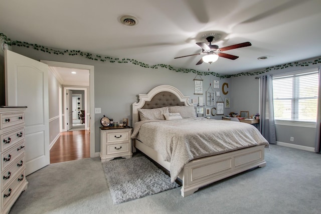 5740 Johnson Rd, Murfreesboro, TN 37127 - bedroom with light colored carpet, baseboards, and ceiling fan