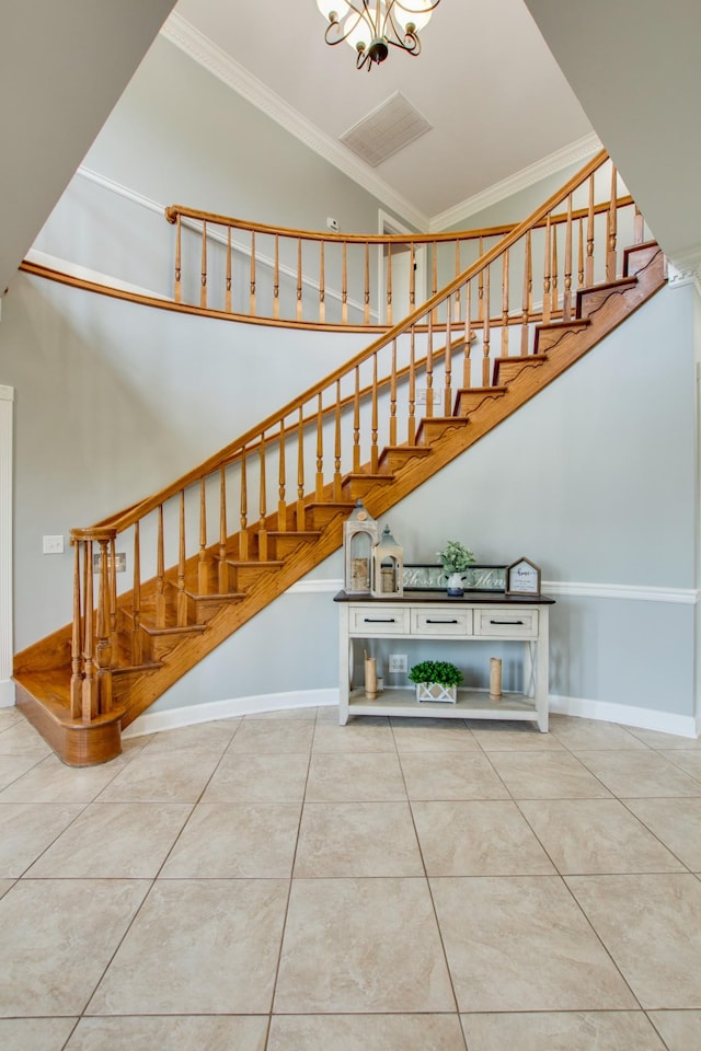 5740 Johnson Rd, Murfreesboro, TN 37127 - staircase with crown molding, tile patterned flooring, baseboards, and a towering ceiling