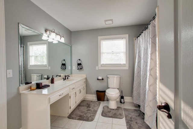 5740 Johnson Rd, Murfreesboro, TN 37127 - full bathroom featuring toilet, tile patterned floors, vanity, and baseboards