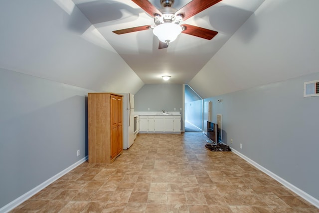 5740 Johnson Rd, Murfreesboro, TN 37127 - bonus room with ceiling fan, baseboards, lofted ceiling, a sink, and stone finish floors