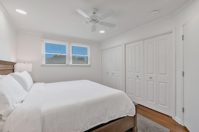 933 Percy Warner Blvd, Nashville, TN 37205 - bedroom with multiple closets, wood finished floors, crown molding, recessed lighting, and ceiling fan