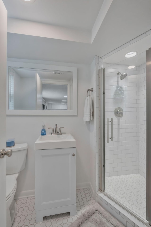 933 Percy Warner Blvd, Nashville, TN 37205 - bathroom with vanity, a shower stall, toilet, and baseboards