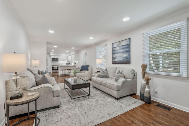 933 Percy Warner Blvd, Nashville, TN 37205 - living area featuring crown molding, wood finished floors, recessed lighting, and baseboards