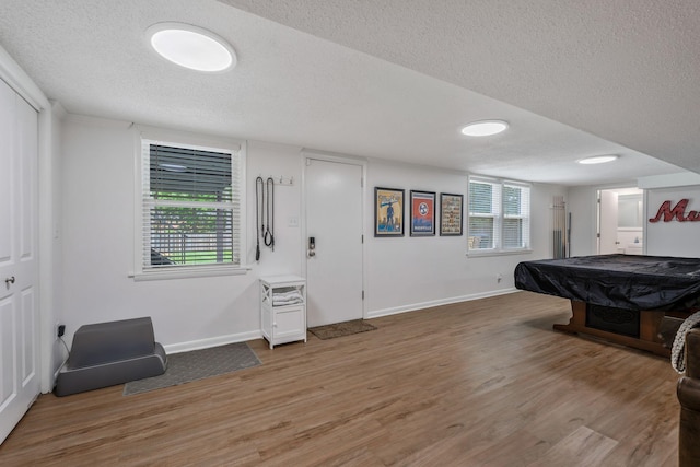 933 Percy Warner Blvd, Nashville, TN 37205 - playroom featuring a textured ceiling, baseboards, light wood-style floors, and pool table