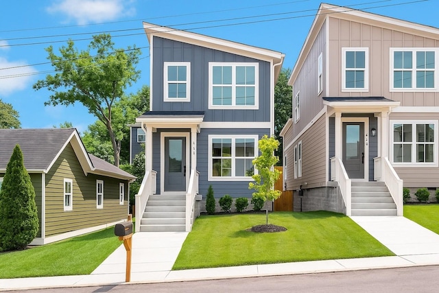 1734A Kellow St, Nashville, TN 37208 - view of front of home featuring board and batten siding and a front yard