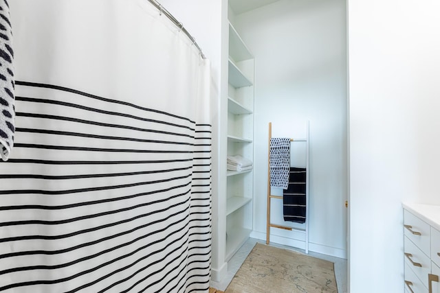 1900 12th Ave S Unit 502, Nashville, TN 37203 - bathroom with vanity and a shower with shower curtain