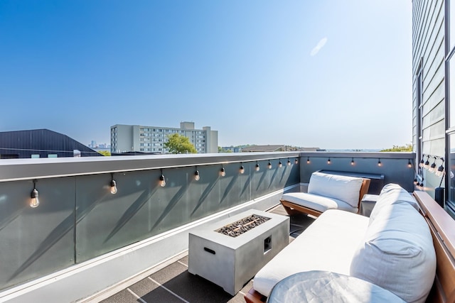 1900 12th Ave S Unit 502, Nashville, TN 37203 - balcony with an outdoor living space with a fire pit