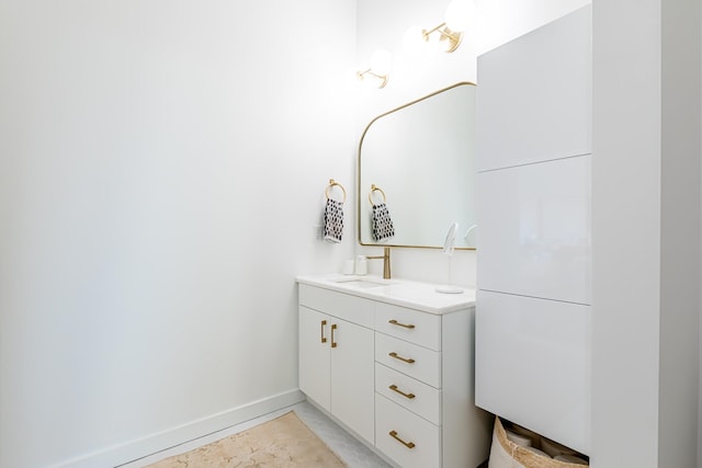 1900 12th Ave S Unit 502, Nashville, TN 37203 - bathroom featuring vanity and baseboards