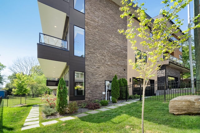 112 47th Ave N, Nashville, TN 37209 - view of property exterior with stone siding and a balcony