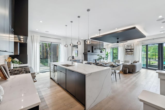 112 47th Ave N, Nashville, TN 37209 - kitchen featuring a sink, open floor plan, modern cabinets, plenty of natural light, and recessed lighting