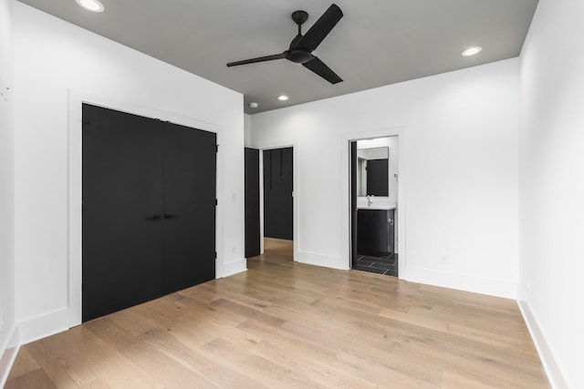 112 47th Ave N, Nashville, TN 37209 - unfurnished bedroom with light wood-type flooring, baseboards, recessed lighting, connected bathroom, and a ceiling fan