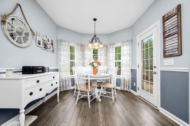 116 Macy Ct, Christiana, TN 37037 - dining room with a chandelier, dark wood finished floors, and baseboards