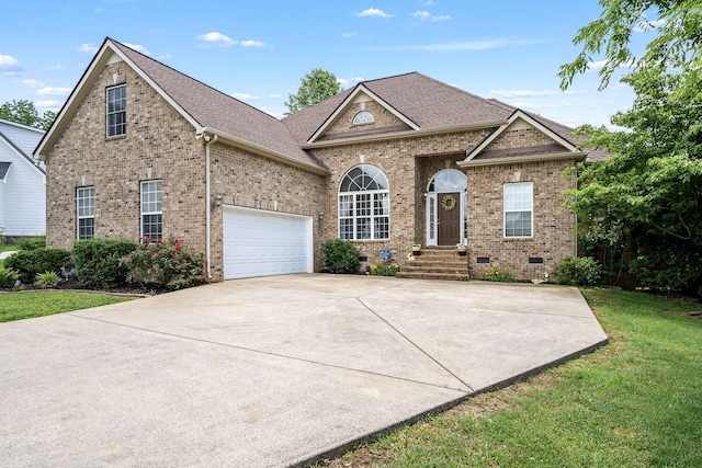 116 Macy Ct, Christiana, TN 37037 - view of front of property with brick siding, concrete driveway, a front lawn, roof with shingles, and a garage
