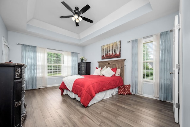 116 Macy Ct, Christiana, TN 37037 - bedroom with a tray ceiling, wood finished floors, baseboards, and ceiling fan