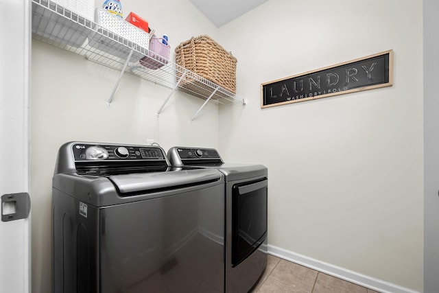116 Macy Ct, Christiana, TN 37037 - laundry room featuring washer and dryer, baseboards, and light tile patterned floors